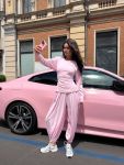Стильный костюм кофты и брюки Аладины розового цвета